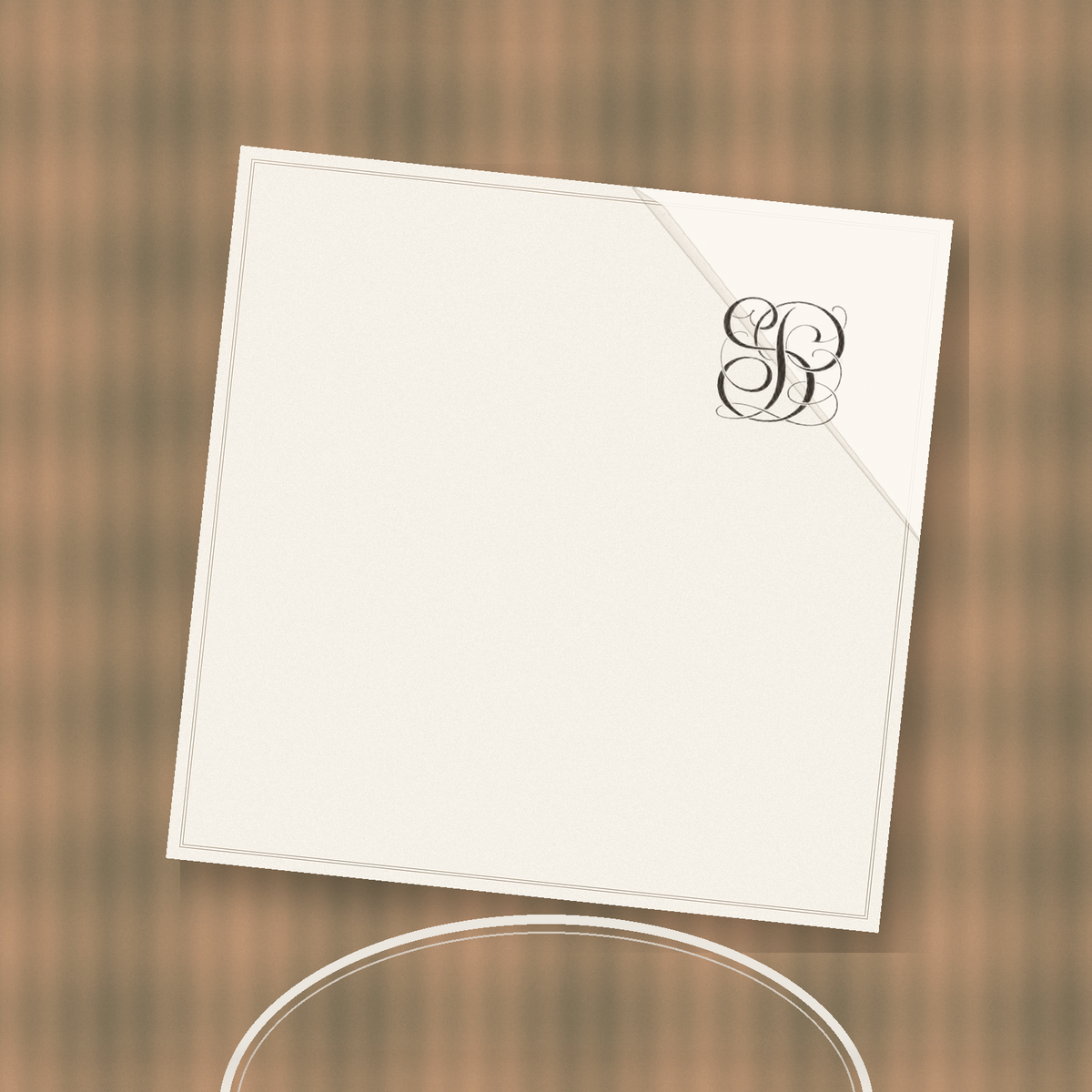 Monogram stamped on a folded napkin